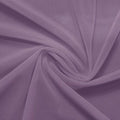 A swirled piece of nylon spandex power mesh in the color purple haze.