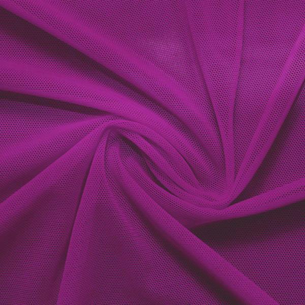 A swirled piece of nylon spandex power mesh in the color rosebud.