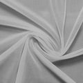 A swirled piece of nylon spandex power mesh in the color stone.