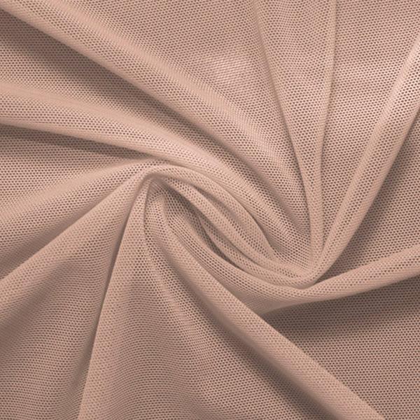 A swirled piece of nylon spandex power mesh in the color taupe.