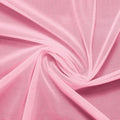 A swirled piece of nylon spandex power mesh in the color venus pink.