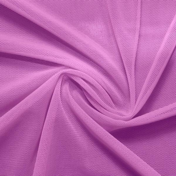 A swirled piece of nylon spandex power mesh in the color wild orchid.