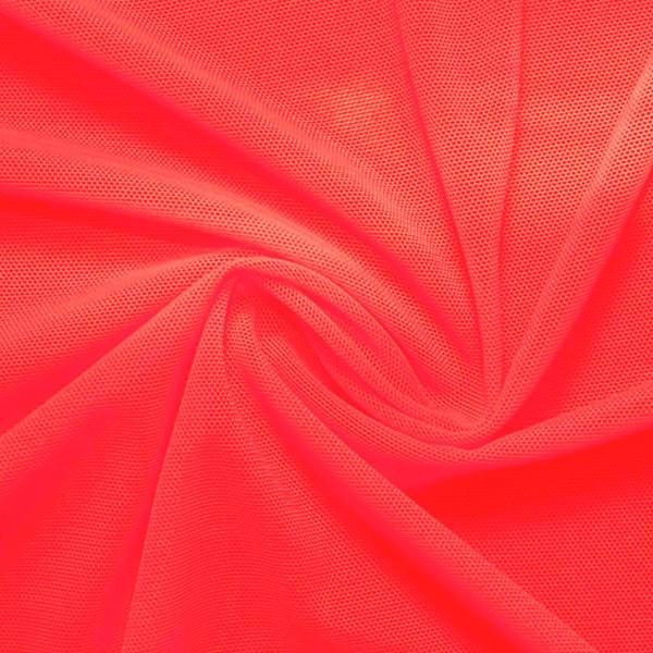 A swirled piece of nylon spandex power mesh in the color wild watermelon.