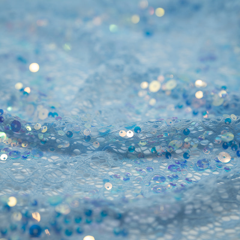 Detailed shot of Precious Stretch Lace Sequin in color Light Blue Iridescent.