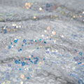 Detailed shot of Precious Stretch Lace Sequin in color Soft Grey Iridescent.