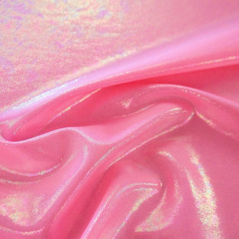 A swirled sample of popcorn polyester spandex jacquard in the color hot pink.