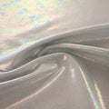 A swirled sample of popcorn polyester spandex jacquard in the color silver.