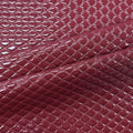 A sample of quilted hipster polyurethane coated spandex in the color Burgundy