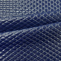 A sample of quilted hipster polyurethane coated spandex in the color navy blue