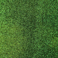 A flat sample of radiance heat transfer glitter in the color dark green.