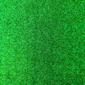 A flat sample of radiance heat transfer glitter in the color kelly green.