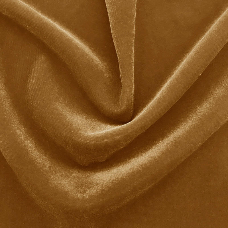 A swirled sample of regal matte stretch velvet in the color beige.