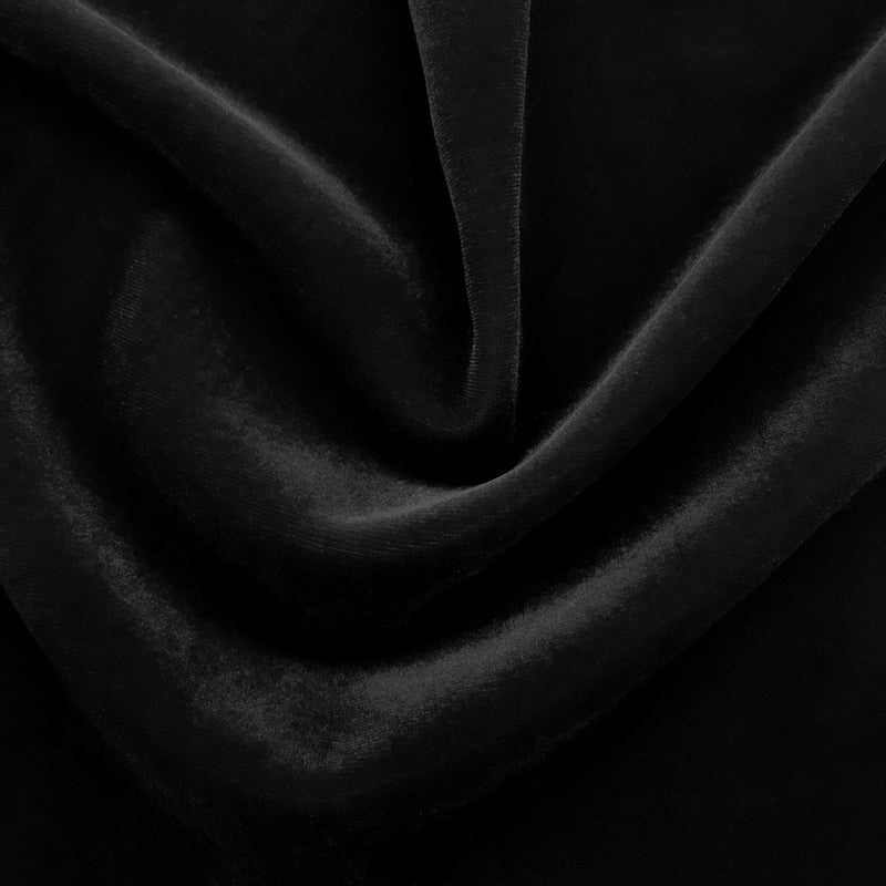 A swirled sample of regal matte stretch velvet in the color black.