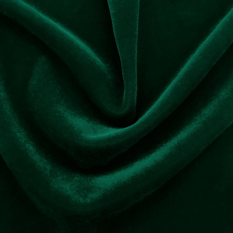 A swirled sample of regal matte stretch velvet in the color hunter green.
