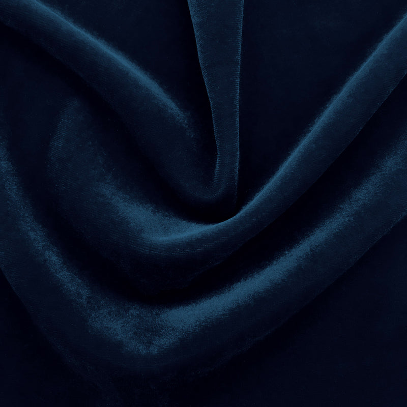 A swirled sample of regal matte stretch velvet in the color navy.