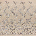 A panel of Renaissance, an embroidered design of leaves and vines with champagne-colored sequin on a champagne stretch mesh base.