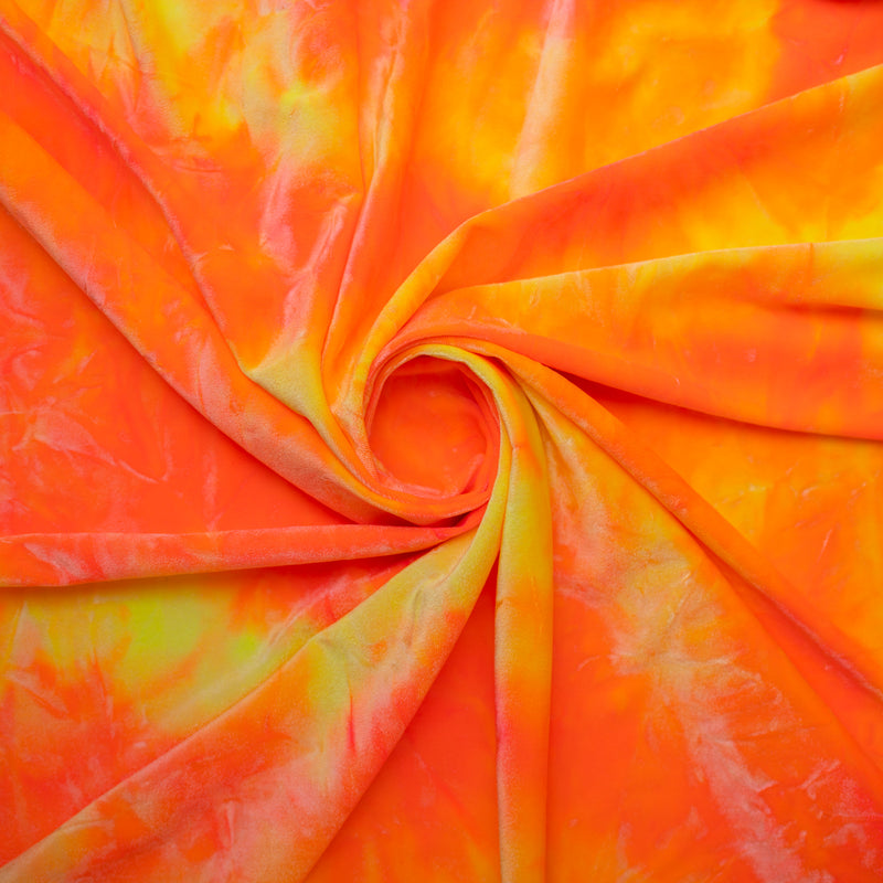 A swirled sample of renegade tie-dyed stretch velvet in Orange.