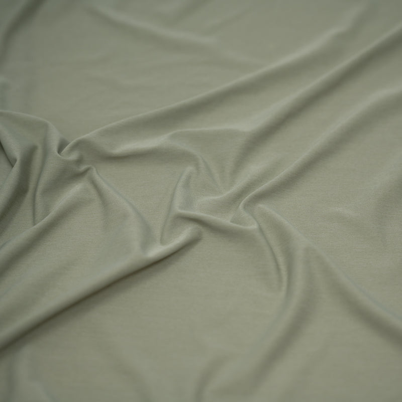 Detailed shot of UniFlex Nylon Polyester Spandex Reversible Knit Top Weight Fabric in color Khaki Green.. 