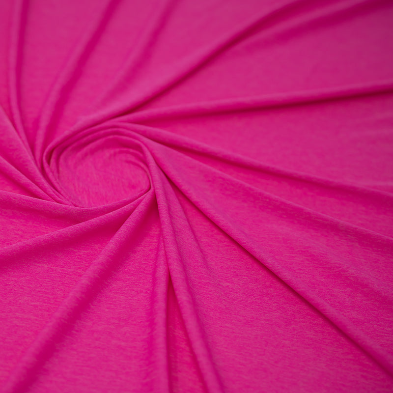 Shot of swirled UniFlex Nylon Polyester Spandex Reversible Knit Top Weight Fabric in color Positive Pink. 