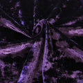 A swirled piece of Revival Crushed Stretch Velvet in the color Dark-Purple 