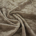 A swirled sample of revival crushed stretch velvet in the color taupe.