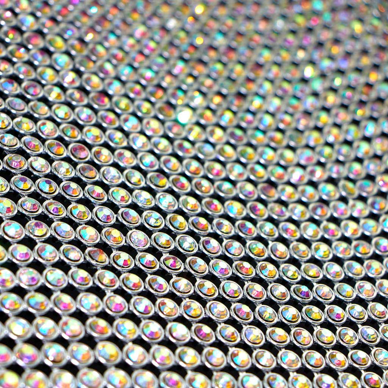 A flat sample of rhinestone aluminum scale mesh in iridescent tones.