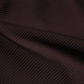 A rippled piece of Ribbed Spandex in the color brown.