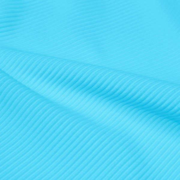 A rippled piece of Ribbed Spandex in the color cyan.