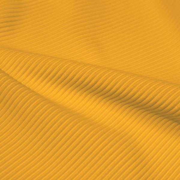A rippled piece of Ribbed Spandex in the color halel yellow.
