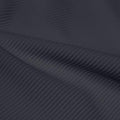 A rippled piece of Ribbed Spandex in the color slate gray.