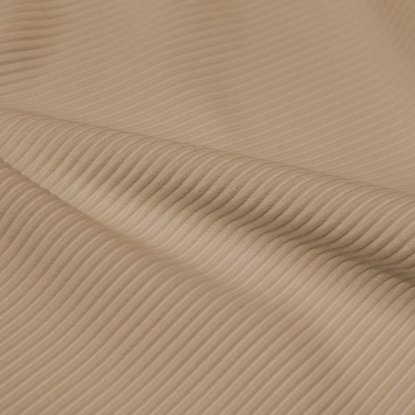 A rippled piece of Ribbed Spandex in the color taupe.