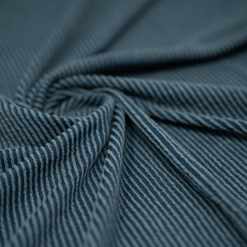 Detailed shot of Rib Knit in color Poseidon Blue.