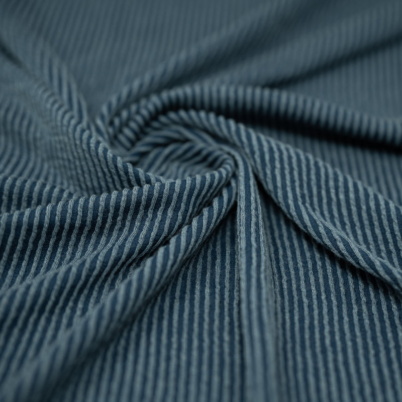 Detailed shot of Rib Knit in color Poseidon Blue.