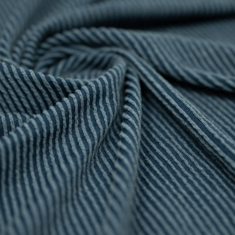 Detailed shot of Rib Knit in color Poseidon Blue.
