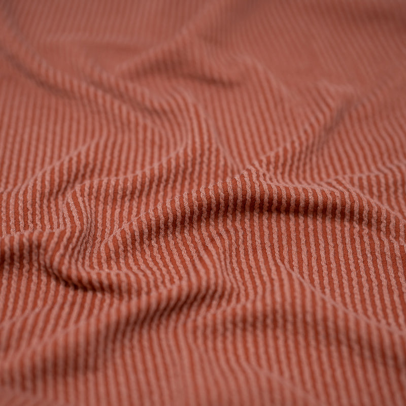 Detailed shot of Rib Knit in color Terracotta.