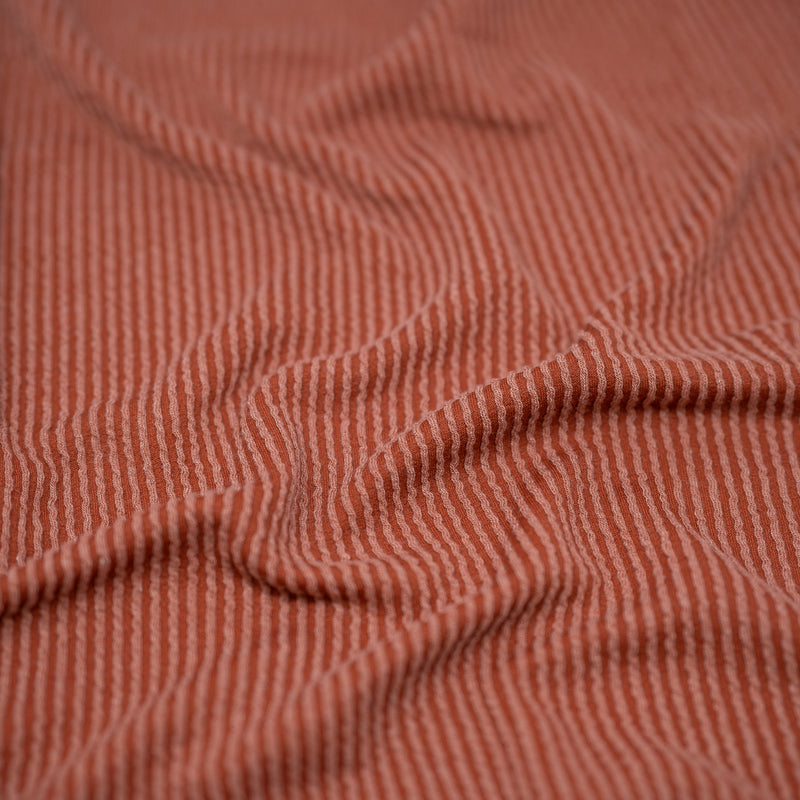 Detailed shot of Rib Knit in color Terracotta.