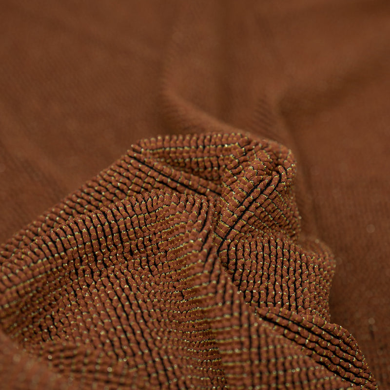Detailed interior shot of Ritzy Crinkle Nylon Polyester Spandex with Metallic in the color Copper