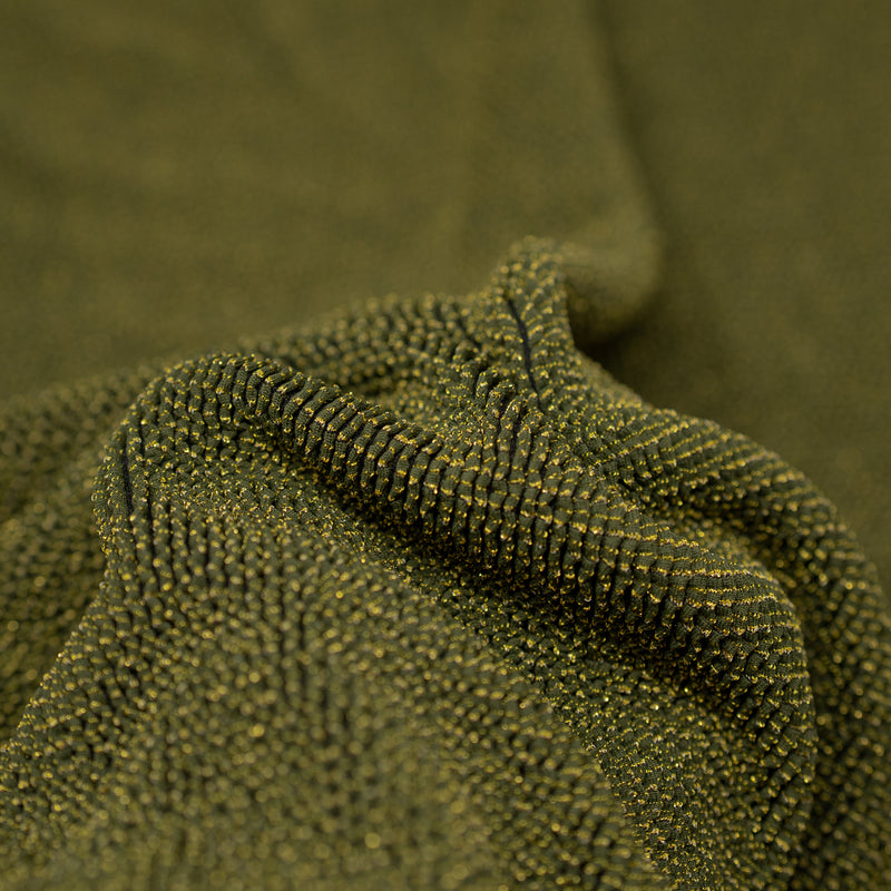 Detailed interior shot of Ritzy Crinkle Nylon Polyester Spandex with Metallic in the color Olive-Twist