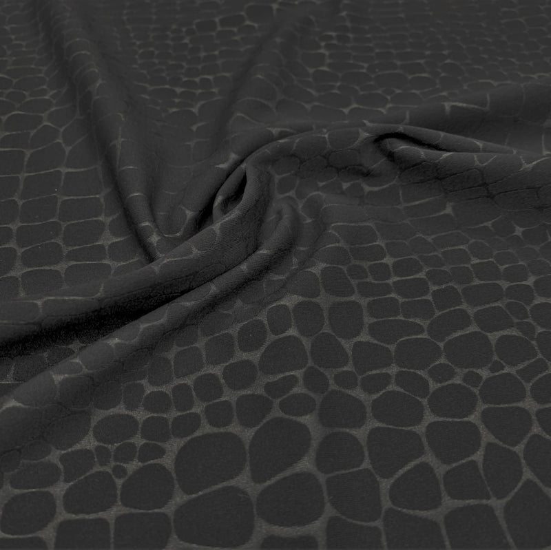 A swirled sample of Rockodile in the color black.