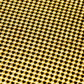 A flat sample of rounded aluminum scale mesh in the color gold.