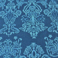 A flat sample of royalty embossed tretch velver in the color aquamarine blue.