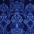 A flat sample of royalty embossed tretch velver in the color sapphire blue.
