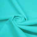 A swirled piece of microfiber nylon spandex in the color  Back to product Cabo Blue