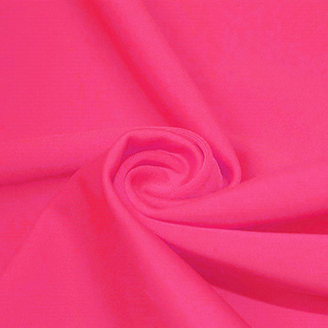 A swirled piece of microfiber nylon spandex in the color Rig Pink