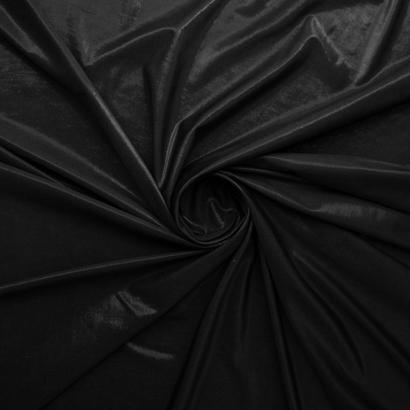 A swirled sample of sheen foiled spandex in the color black