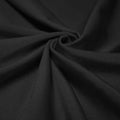 A swirled piece of shiny nylon spandex in the color black.