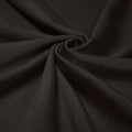 A swirled piece of shiny nylon spandex in the color charcoal.