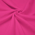 A swirled piece of shiny nylon spandex in the color passmatazz.