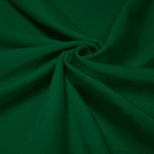 A swirled piece of shiny nylon spandex in the color sequoia.