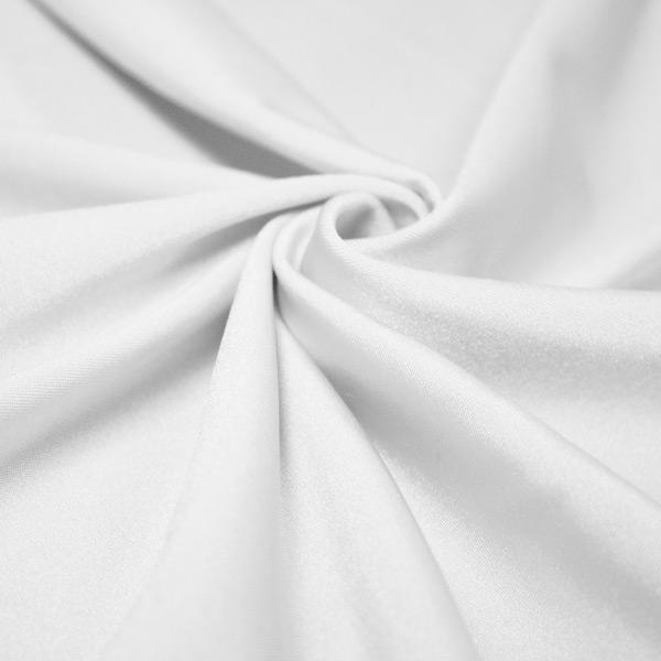 A swirled piece of shiny nylon spandex in the color snow white.